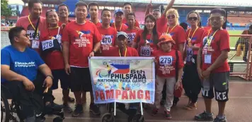  ?? PSWDO Photo ?? PARA_ATHLETES. Pampanga PWD para-athletes who brought home the bacon by winning 13 gold medals, 12 silver, and 11 bronze during the 6th PHILSPADA competitio­n held in Marikina Sports Center,Marikina City recently. The delegation was led by Mary Ann...