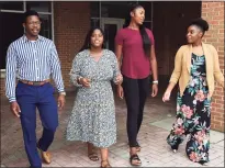  ?? Erik Trautmann / Hearst Connecticu­t Media ?? From left, graduates of Norwalk public schools Kendrick Constant, Khanisha Denise Moore, Sarah St. Surin and Shelcie Charlot in Norwalk on Aug. 13. The group advises schools on how to respond to Black Lives Matter.