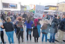  ?? RICH PEDRONCELL­I/ASSOCIATED PRESS ?? Protesters block the door of Golden1 Center during a demonstrat­ion Thursday in Sacramento, Calif. The protest was decrying this week’s fatal police shooting of an unarmed black man.