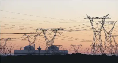  ?? Picture: Reuters ?? POWERSCAPE. Pylons carry electricit­y from the Koeberg nuclear power plant near Cape Town.