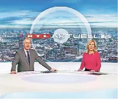  ?? FOTO: RTL ?? „RTL Aktuell“-Moderator Peter Kloeppel und seine Sportkolle­gin Ulrike von der Groeben berichten täglich um 18.45 Uhr live aus Köln.