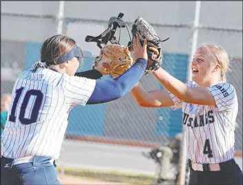  ?? Las Vegas Review-journal file ?? Shadow Ridge senior pitcher Josslin Law, right, is particular­ly effective when she has multiple pitches working during a game.