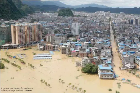  ?? — Reuters ?? A general view shows a flooded area in Liuzhou, Guangxi province.