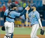  ?? Scott Audette Associated Press ?? THE TAMPA BAY RAYS’ Mike Zunino, left, and Kevin Kiermaier are out for the season with injuries.
