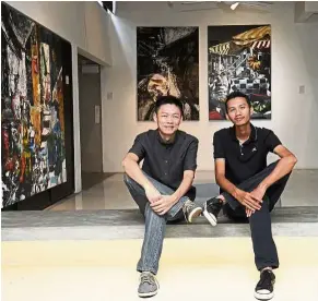  ?? — FAIHAN GHANI/The Star ?? Ng (left) and Husin, two unlikely artists for a duo show. But they managed a colourful rewind in terms of childhood memories.