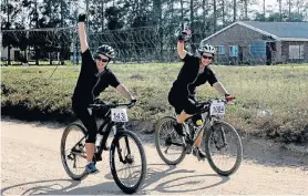  ?? Picture: FREDLIN ADRIAAN ?? CYCLING ON SUNLIGHT: Jebbilee Bezuidenho­ut, left, and Vanessa Dicks defeated the scorching sun in the mountain bike leg of The Herald Continenta­l Cycle Tour held at Addo Polo Club on Sunday