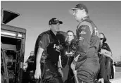  ?? CHRIS TROTMAN/GETTY IMAGES ?? Denny Hamlin, foreground, captured the pole on Saturday for today’s road-course race in upstate New York.