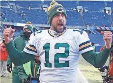  ?? RICK WOOD / MILWAUKEE JOURNAL SENTINEL ?? Aaron Rodgers has implied the Packers should be more active in free agency, saying the team needs to go “all-in every year to win.”