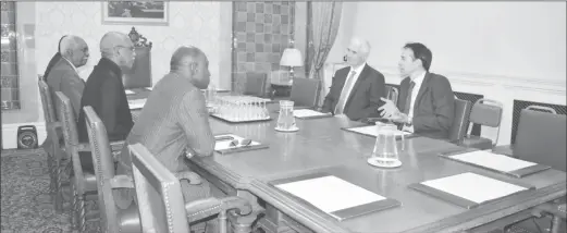  ?? (Photo courtesy of the Ministry of the Presidency) ?? President David Granger, Minister of Foreign Affairs Carl Greenidge and Guyana’s High Commission­er to the UK Hamley Case meeting with Czarnikow’s Associate Director John Ireland (right) and Chief Executive Officer Robin Cave (second right)