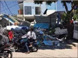  ?? (DR) ?? Des milliers de touristes bloqués sur l’île de Lombok après un deuxième séisme particuliè­rement meurtrier.