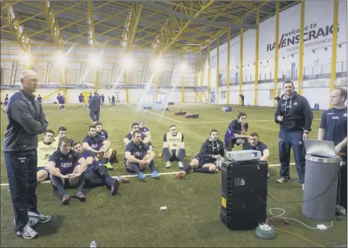  ?? Picture: Alan Harvey/SNS/SRU ?? scotland assistant coach duncan hodge, left, talks his group of players through video footage of the Ireland game