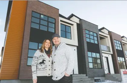  ?? IAN KUCERAK ?? Kim and Sam Ireland are ready to move into their new home in the Blatchford Developmen­t in Edmonton, which is being developed on the former site of the City Centre Airport. The first residents have started moving into homes on the west side of the community.