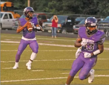  ?? Terrance Armstard/News-Times ?? Standing tall: El Dorado quarterbac­k Alex Hicks drops back to pass in action Friday night against Camden Fairview. Hicks has accounted for eight touchdowns in the Wildcats' first two games this season.