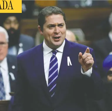  ?? BLAIR GABLE/REUTERS ?? Conservati­ve party Leader Andrew Scheer speaks in the House of Commons in Ottawa Friday, where he proposed an amendment that would commit the government to scrap the carbon tax, which no other party is onside with.