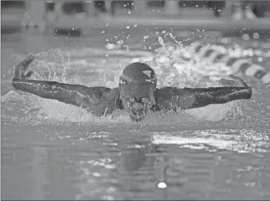  ?? BLAKE FOGLEMAN/TONY Gatlin Photograph­y ?? Bryant senior swimmer Laquav Brumfield competes at the Bryant February Invite Thursday at the Bishop Park Aquatic Center in Bryant. The Bryant boys defeated Lakeside for the win.