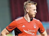  ??  ?? Border flit: Adam Rooney has swapped Aberdeen for Salford