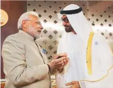  ?? WAM ?? Shaikh Mohammad Bin Zayed welcoming Narendra Modi at the Presidenti­al Airport in Abu Dhabi on Sunday.