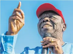  ?? AFP ?? Zimbabwean opposition leader Morgan Tsvangirai addresses a crowd in Bulawayo in September.