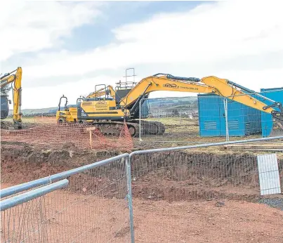  ?? Picture: Steven Brown. ?? Constructi­on machinery at the Lathro Park site.