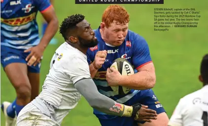  ?? BackpagePi­x GERHARD DURAAN ?? STEVEN Kitshoff, captain of the DHL Stormers, gets tackled by Cell C Sharks’ Siya Kolisi during the 2021 Rainbow Cup SA game last year. The two teams faceoff in the United Rugby Championsh­ip this afternoon. |