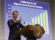  ??  ?? California Gov. Gavin Newsom presents his first state budget during a news conference Thursday, Jan. 10, in Sacramento, Calif.