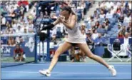  ?? ADAM HUNGER — THE ASSOCIATED PRESS ?? Maria Sharapova returns a shot from Timea Babos during the second round of the U.S. Open Wednesday in New York.