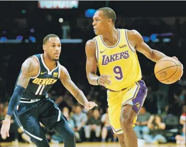  ?? Gary Coronado Los Angeles Times ?? VETERAN POINT GUARD Rajon Rondo, defended by Monte Morris, is expected to be in the starting lineup Thursday night when the LeBron James-led Lakers open the season against the Portland Trail Blazers.