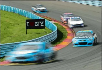  ?? MATT SLOCUM/AP PHOTO ?? Drivers enter the Esses during the NASCAR Monster Cup race on Sunday at Watkins Glen, N.Y.