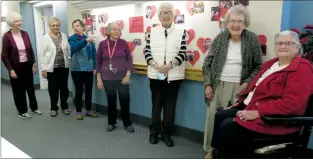  ?? NEWS PHOTO ?? Eileen Marchand, Elsie Kirschenma­n, Netty Prins, Cora Knoblich, Shirley Stevenson, Ethel Barnstable and Marj Hutcheson at Chinook Village stand in front of a Wall of Sweetheart­s created to celebrate Valentine’s Day.