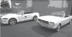  ??  ?? The 10-millionth Mustang sits alongside the first one built, at an event at Ford’s Flat Rock assembly plant on August 8, the day the car was built.