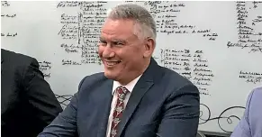  ??  ?? Associate Education Minister Kelvin Davis, centre, was all smiles ahead of his Ma¯ori lesson in Parliament yesterday.