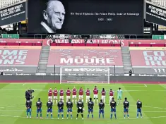  ??  ?? A two-minute silence held for the Duke at West Ham against Leicester City yesterday