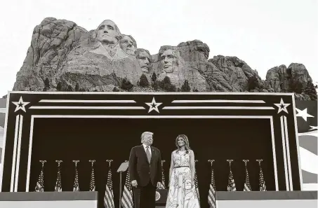  ?? Saul Loeb / AFP via Getty Images ?? President Donald Trump and first lady Melania Trump arrive at Mount Rushmore in Keystone, S.D. Trump accused left-wing protesters of trying to erase history. “This movement is openly attacking the legacies of every person on Mount Rushmore.”