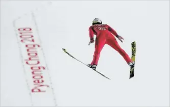  ?? KIRSTY WIGGLESWOR­TH THE ASSOCIATED PRESS ?? Jonathan Learoyd, of France, soars through the air in Pyeongchan­g, Thursday.