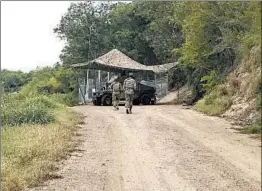  ?? VERONICA G. CARDENAS ?? National Guard troops patrol the border Tuesday in Roma, Texas. Three border states have committed at least 1,600 troops after a request from President Donald Trump.