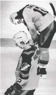  ?? DON DENTON/FILES ?? Stan Smyl and Doug Halward skate dejectedly off the ice after the Islanders won Game 4 and the Cup.