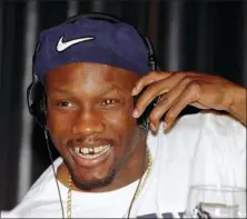  ?? LENNOX MCLENDON — THE ASSOCIATED PRESS FILE ?? In this file photo, WBC welterweig­ht champion Pernell Whitaker adjusts his head phones during a news conference in Las Vegas. Former boxing champion Pernell Whitaker has died after he was hit by a car in Virginia. He was 55.