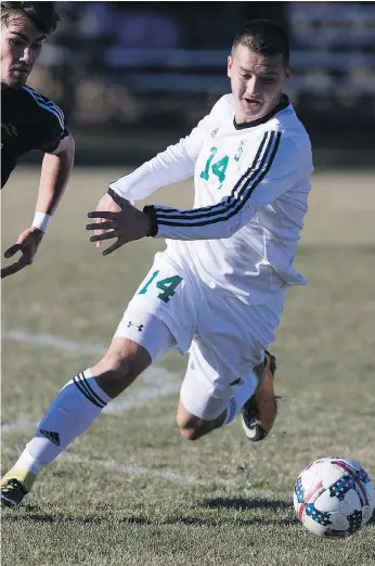  ?? KAYLE NEIS/FILES ?? Thompson Rivers defender Jan Pirretas Glasmacher fights for the ball against Huskies striker Tyler Redl. The Huskies’ regular-season home-opener is Saturday against the Alberta Golden Bears.