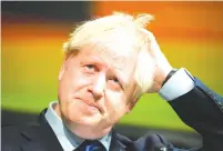  ?? (Christophe­r Furlong/Reuters) ?? BRITISH PRIME MINISTER Boris Johnson reacts during the Convention of the North at the Magna Centre in Rotherham, Britain, on Friday.