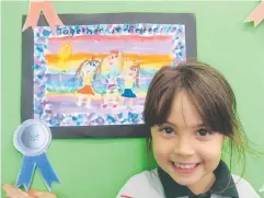  ??  ?? WINNER: Holy Cross Prep student Mya Canuto with her artwork.