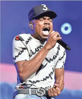  ?? ROB GRABOWSKI / ASSOCIATED PRESS ?? Chance The Rapper performs on day three at Lollapaloo­za in Grant Park on Saturday in Chicago.