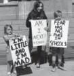  ?? Elizabeth Hernandez, The Denver Post ?? Four-year-old Sariah Larue, left, stands with two of her siblings at the event.