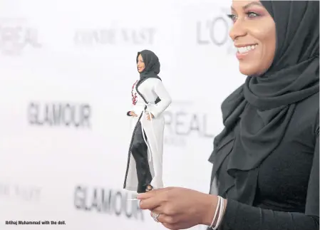  ??  ?? Ibtihaj Muhammad with the doll.