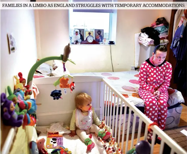  ?? AFP ?? Sandra Rumkiene with her daughter Jessica in their bedroom in Connect House sheltered housing in Mitcham. —