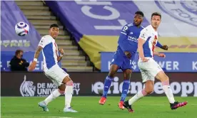  ??  ?? Kelechi Iheanacho fires the ball past Vicente Guaita to complete Leicester’s comeback. Photograph: Nigel Keene/ProSports/REX/Shuttersto­ck