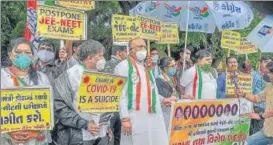  ?? PTI ?? Congress workers protest seeking to postpone JEE and NEET exams, in Surat on Friday.