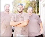  ?? RACHEL DICKERSON/MCDONALD COUNTY PRESS ?? Robert Faulkner, Trevyn Faulkner and Shanna Faulkner take a break from their work at RTF Tire and Service in Noel.