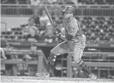  ?? CHARLES LECLAIRE/USA TODAY SPORTS ?? The Diamondbac­ks’ Ketel Marte hits the game-winning single against the Pirates during the 13th inning at PNC Park on Friday in Pittsburgh.