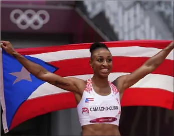  ?? MATTHIAS SCHRADER — THE ASSOCIATED PRESS FILE ?? Jasmine Camacho-quinn, of Puerto Rico, celebrates after winning the women’s 100-meter hurdles final at the 2020Summer Olympics, Monday, Aug. 2, 2021, in Tokyo.