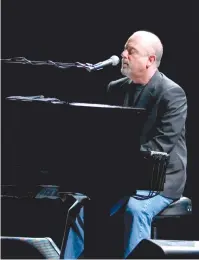  ?? (Nicolas Khayat/Abaca Press/TNS) ?? BILLY JOEL performs in front of a sold-out Madison Square Garden in New York in 2006.